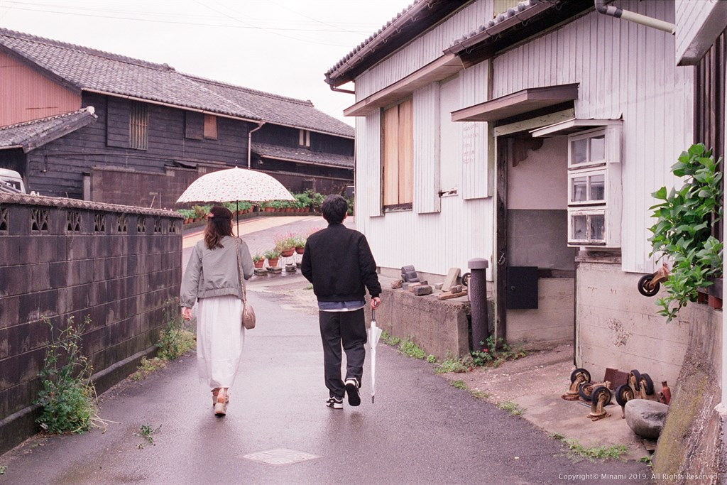 雨の中を君と